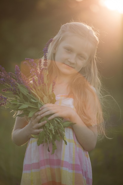 Beautiful girl on the meadow