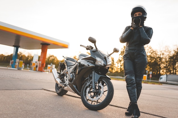 Beautiful girl and a motorcycle