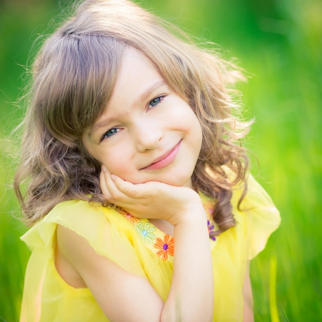 Beautiful girl outdoors in spring park