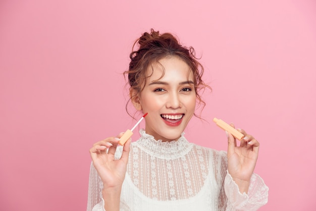 Beautiful girl on a pink background