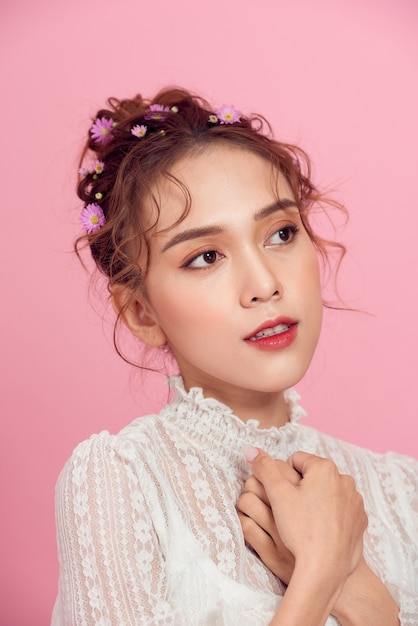 Beautiful girl on a pink background