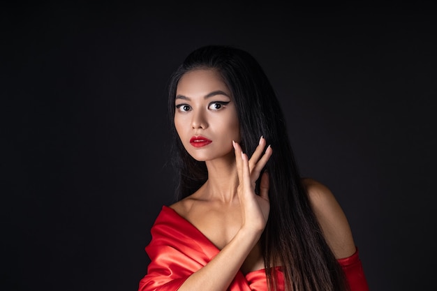 Beautiful girl in a red dress