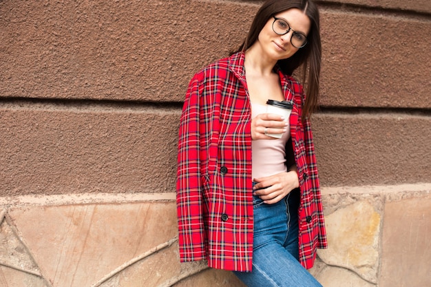 Beautiful girl in a red jacket