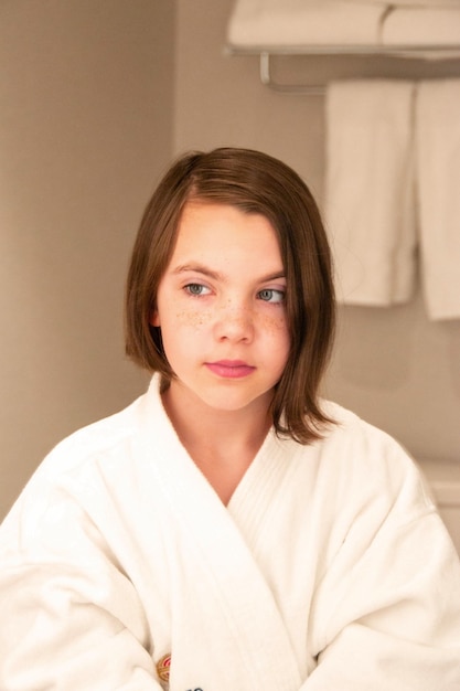 Beautiful girl sexy in a Bathrobe posing in the interior of the room