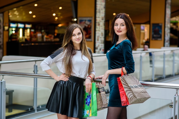 Beautiful girl smiling and doing shopping in the Mall.