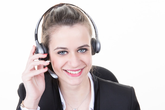 Beautiful girl smiling teleoperator with headset on head