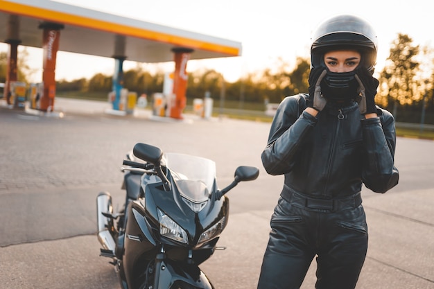 Beautiful girl on a sports motorcycle