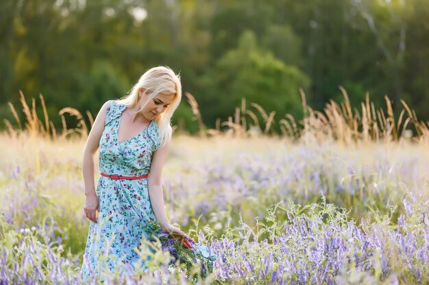 beautiful girl in a summer field