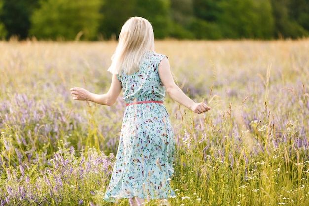 beautiful girl in a summer field