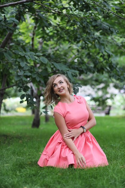 Beautiful girl in the summer park