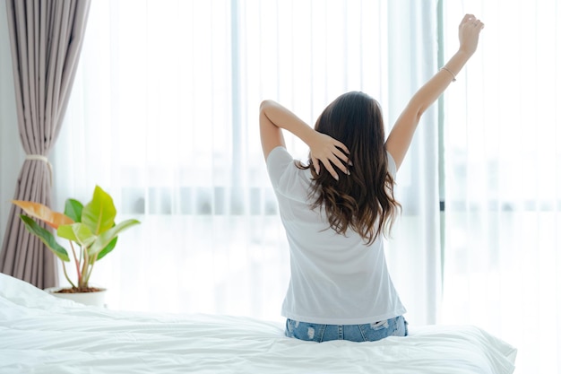 Beautiful girl waking up in the morning