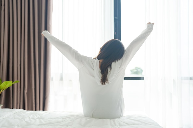 Beautiful girl waking up in the morning