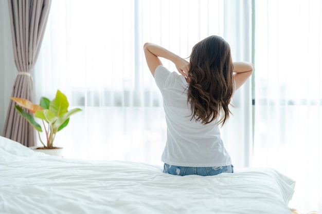 Beautiful girl waking up in the morning