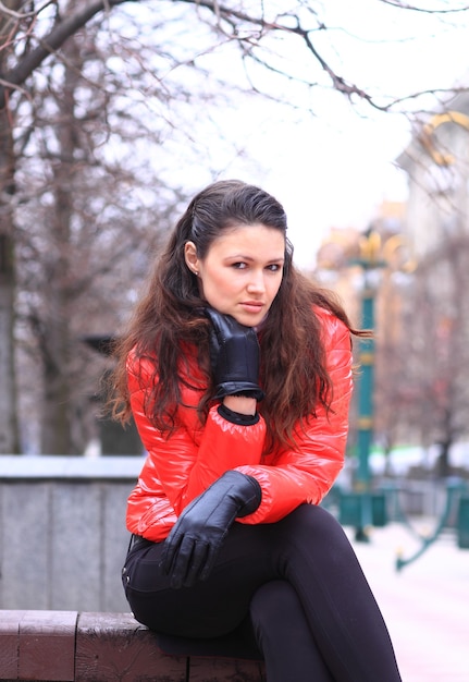 Beautiful girl walking down the street.