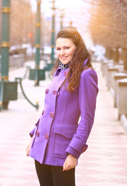 Beautiful girl walking down the street