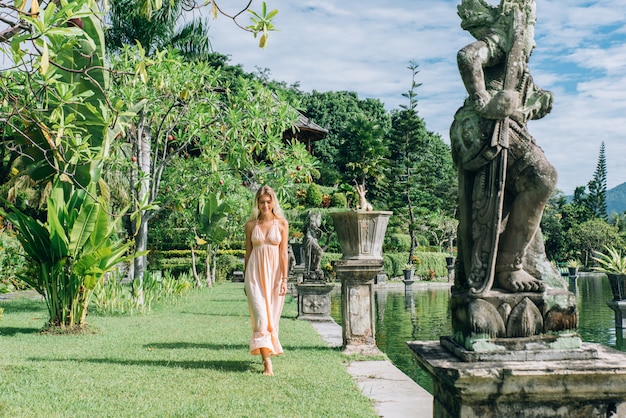 Beautiful girl at Water Palace in Bali