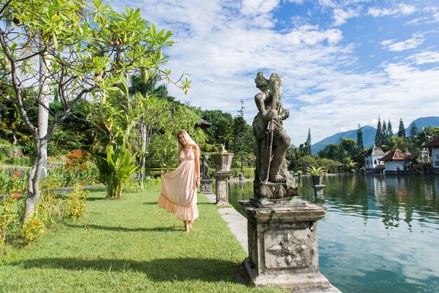 Beautiful girl at Water Palace in Bali