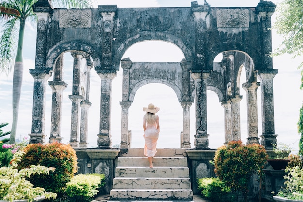 Beautiful girl at Water Palace in Bali