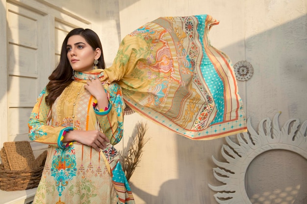 Beautiful Girl Waving Dupatta Landscape for Fashion Shoot at Traditional Location