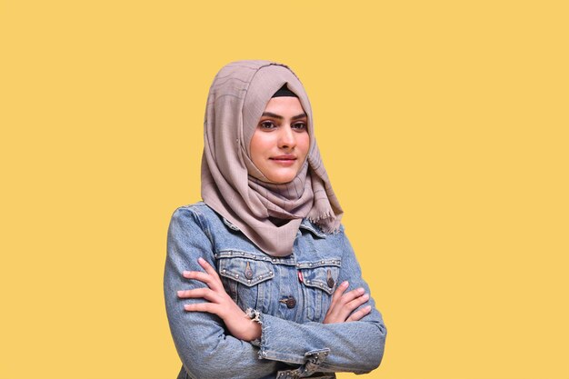 beautiful girl wearing hijab with denim jacket with folded hands indian pakistani model