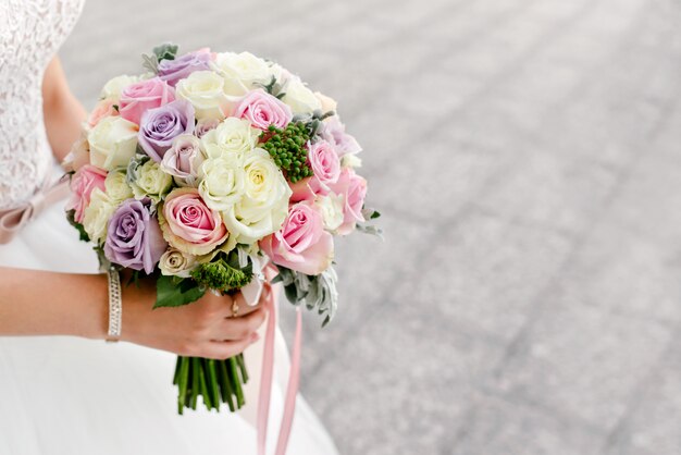 The beautiful girl in a wedding dress