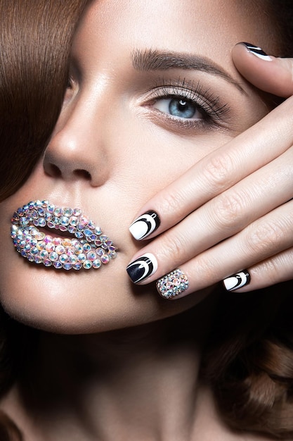 Beautiful girl with bright nails, lips of crystals, long Stock Photo |  Adobe Stock