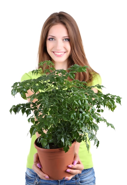 Beautiful girl with flower in pot isolated on white