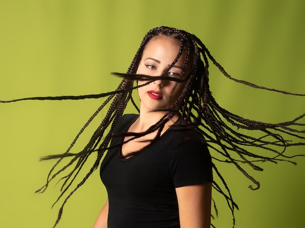 Beautiful girl with pigtails in her hair