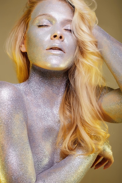 Beautiful Girl with Sparkles on her Face and Body