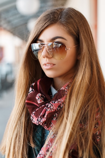 Beautiful girl with sunglasses outdoors