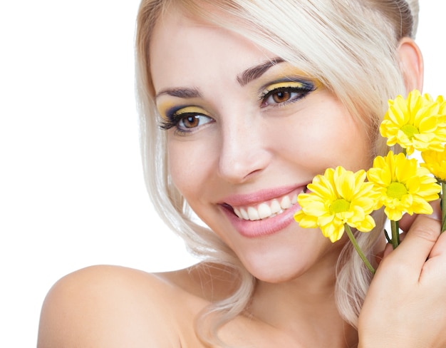 Beautiful girl with yellow flowers