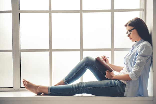 Beautiful girl working at home