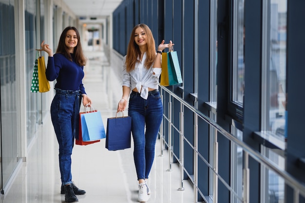 beautiful girls at the mall shopping