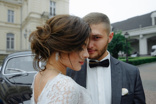 Beautiful gorgeous bride and stylish handsome groom