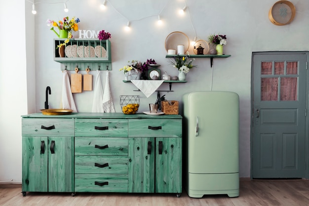 Foto bellissimo design degli interni della cucina verde