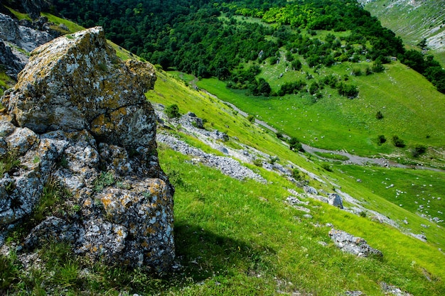 Beautiful green landscapes with hills forest and rocks in Moldova