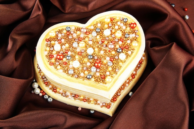 Beautiful hand made casket, on silk background