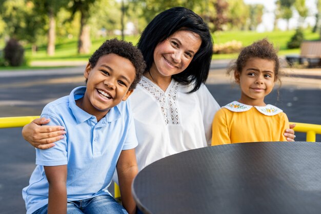 Beautiful happy african american family bonding at the park