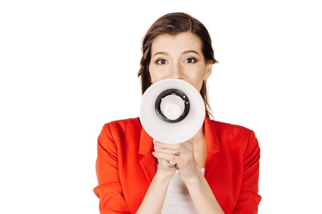 beautiful happy business woman holding megaphone with red suit