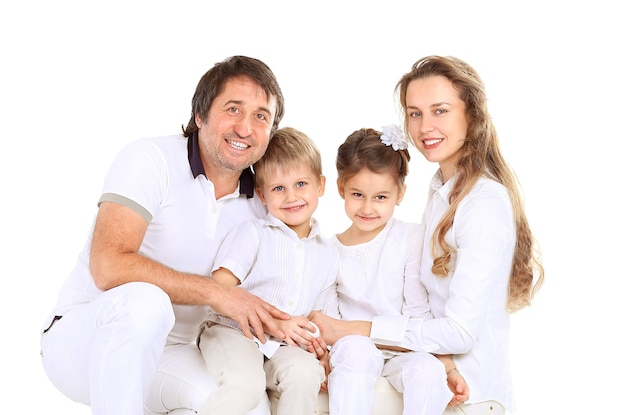 Photo beautiful happy family - isolated over a white