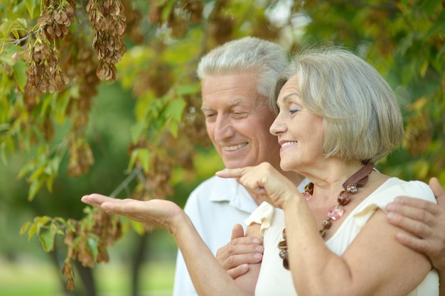 Beautiful happy old people in the park