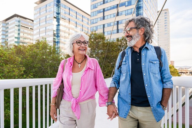 Beautiful happy senior couple bonding outdoors