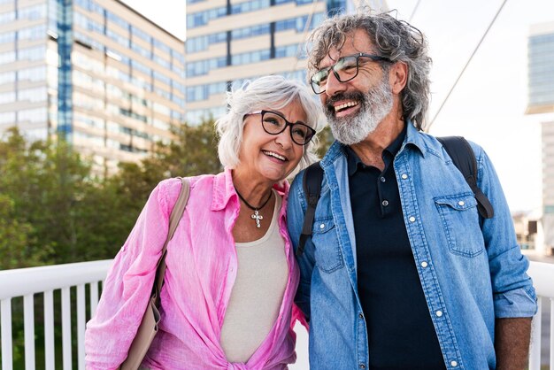 Beautiful happy senior couple bonding outdoors