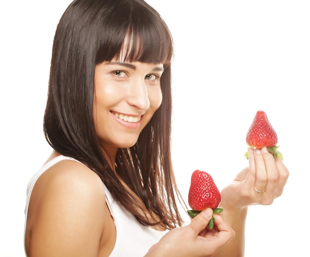 Photo beautiful happy smiling woman with strawberry