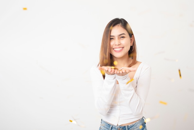 Beautiful happy woman is celebrating 