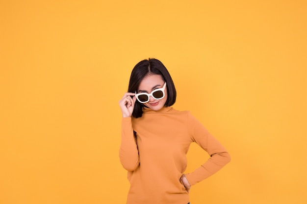 Beautiful happy woman wearing sunglasses