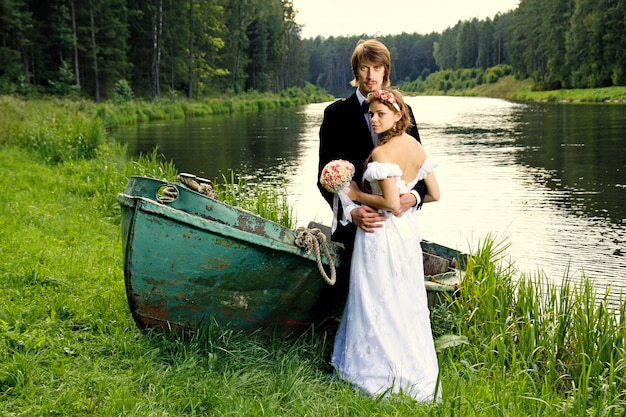 Beautiful happy young bride and groom