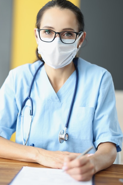 Beautiful health centre worker in cabinet