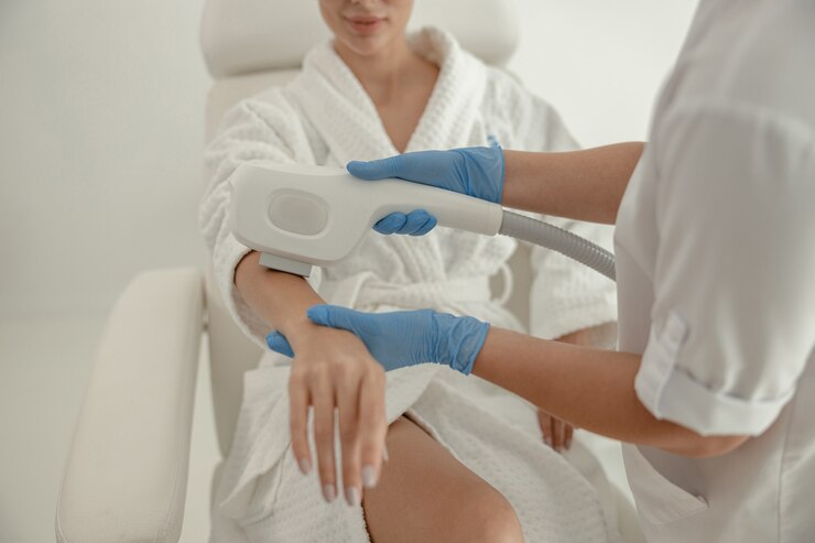 Beautiful healthy smiling caucasian woman is doing beauty procedures at spa and healthcare salon