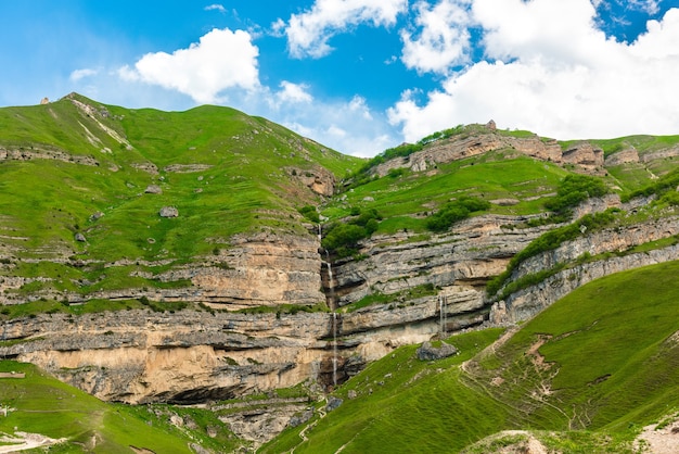 Beautiful high waterfall in the mountains